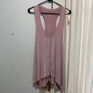 Comfy low cut tank that falls just below the bum!